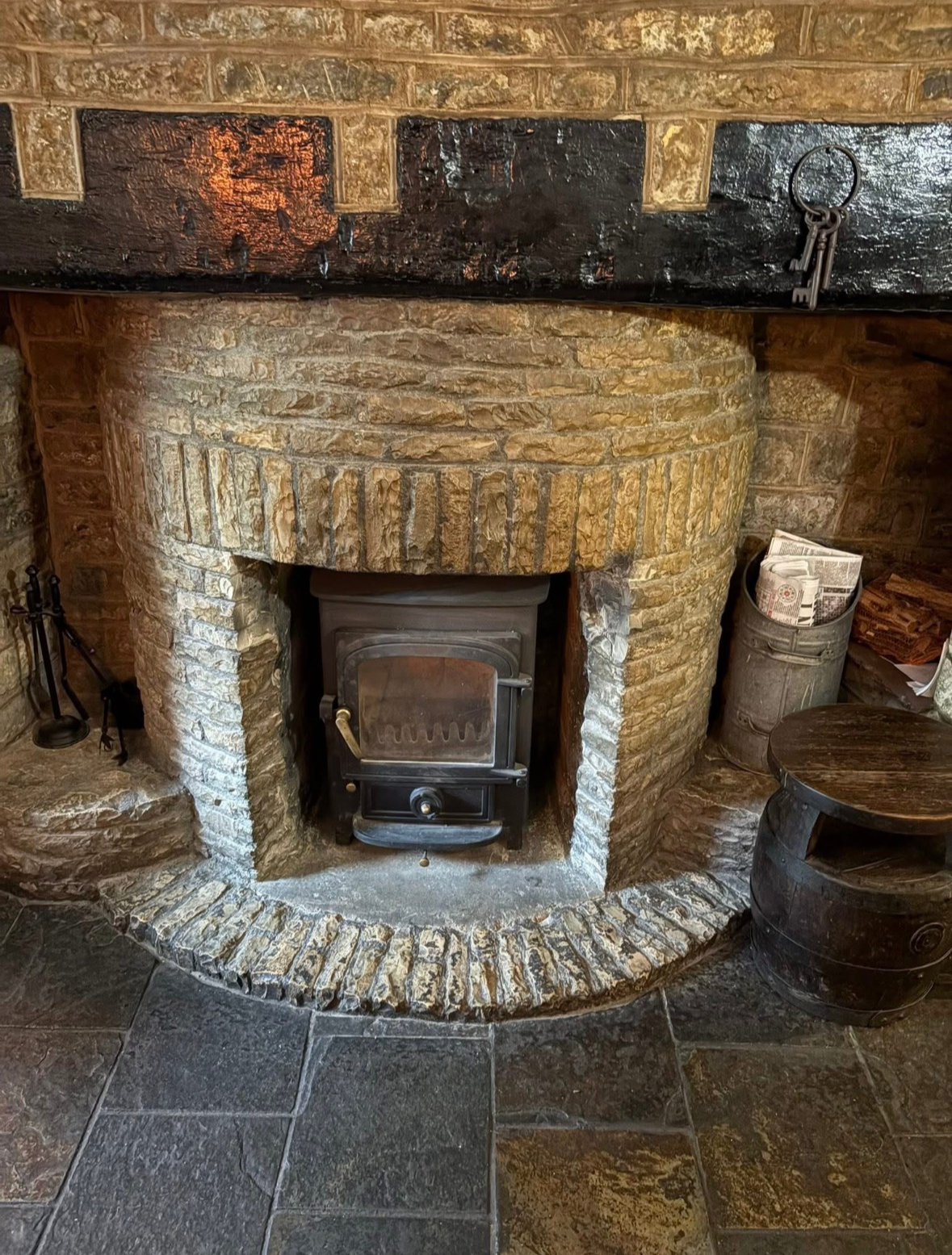 Stove firebox interior showing soot build up before cleaning
