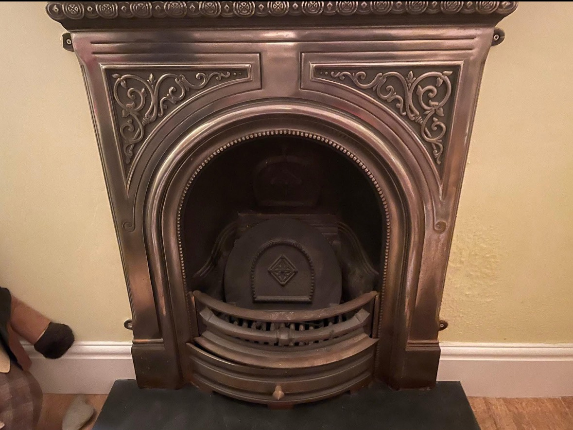 Cast iron fireplace after a professional chimney sweep